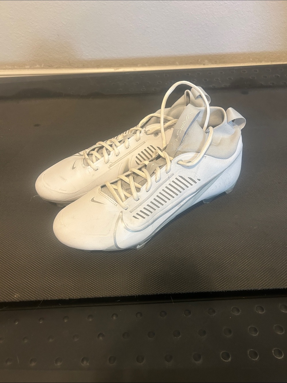 Nike Men's White Athletic Cleats - All-White Design